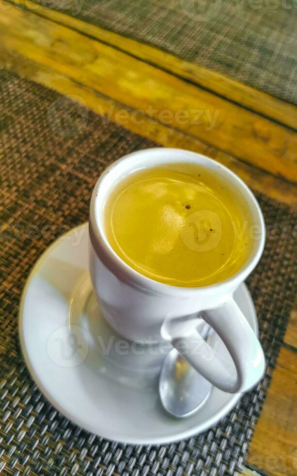 Cup of americano black coffee in restaurant cafe in Mexico. photo