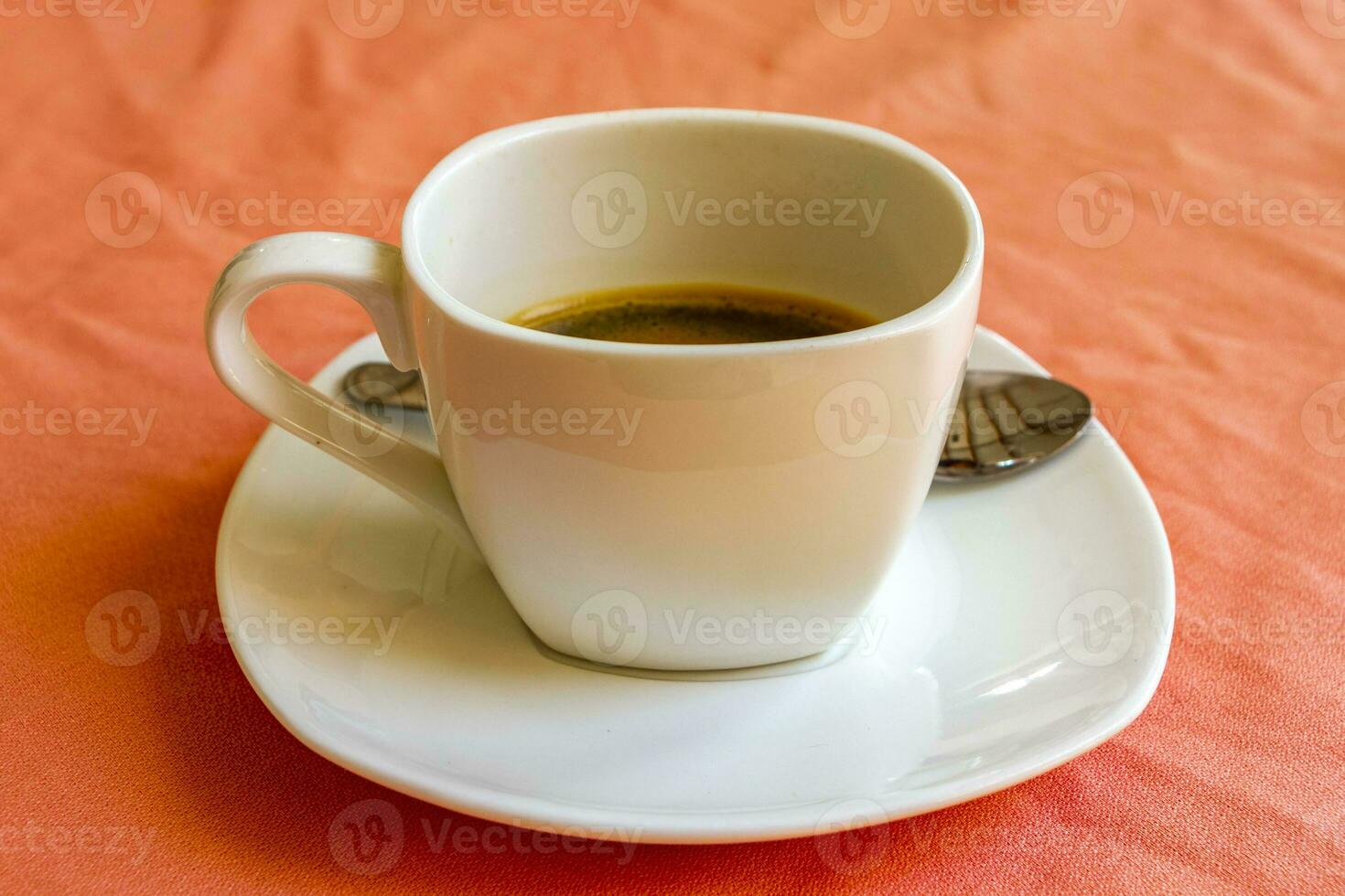 Cup with black coffee in resort Rasdhoo Atoll island Maldives. photo