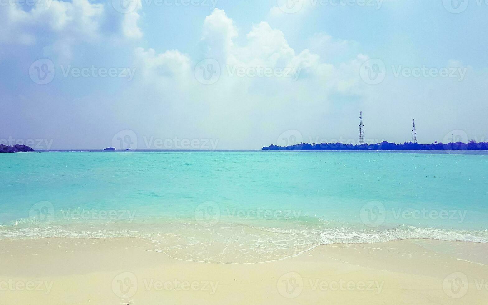 Rasdhoo island view from tropical sandbank islands Madivaru Finolhu Maldives. photo