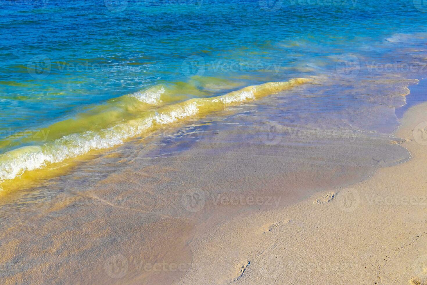 Waves at tropical beach caribbean sea clear turquoise water Mexico. photo