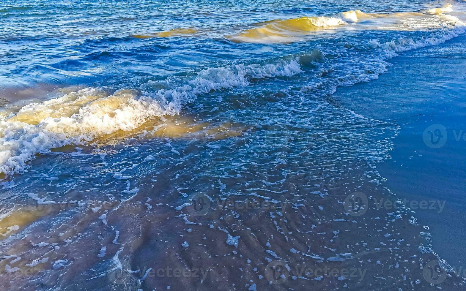 Waves at tropical beach caribbean sea clear turquoise water Mexico. photo