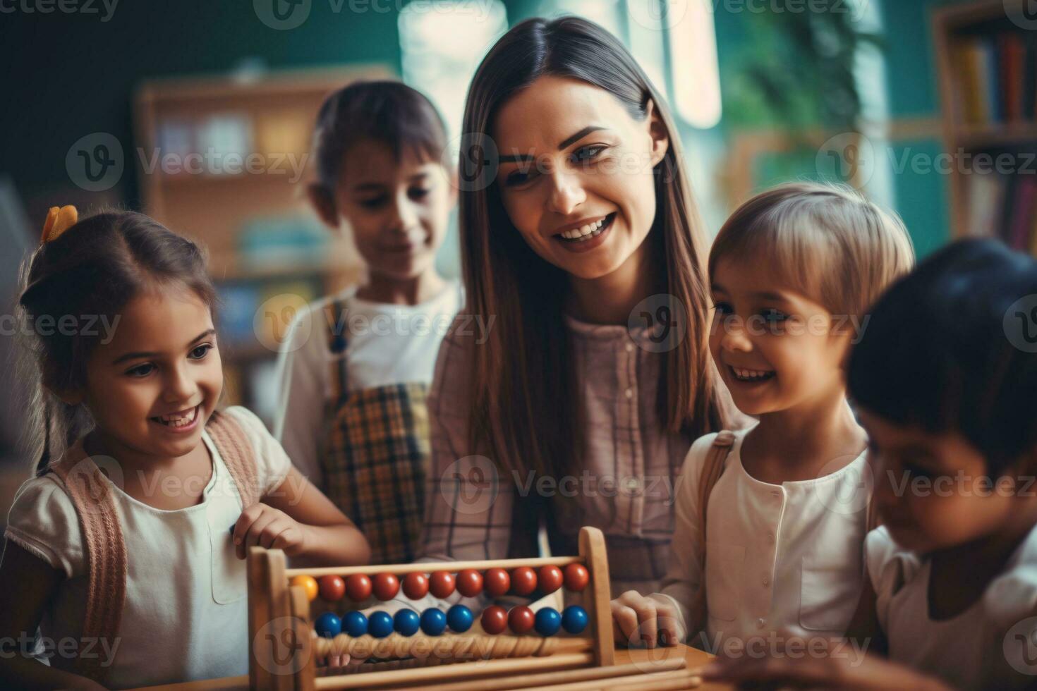 The teacher is teaching children at school photo