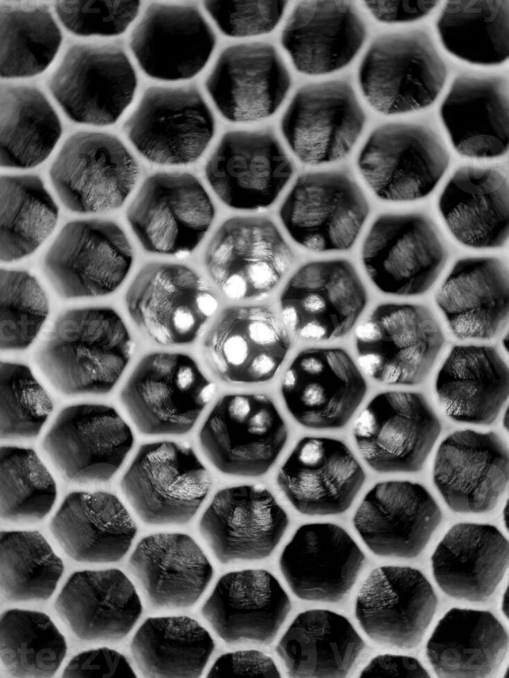 La estructura hexagonal abstracta es un panal de abejas de la colmena. foto