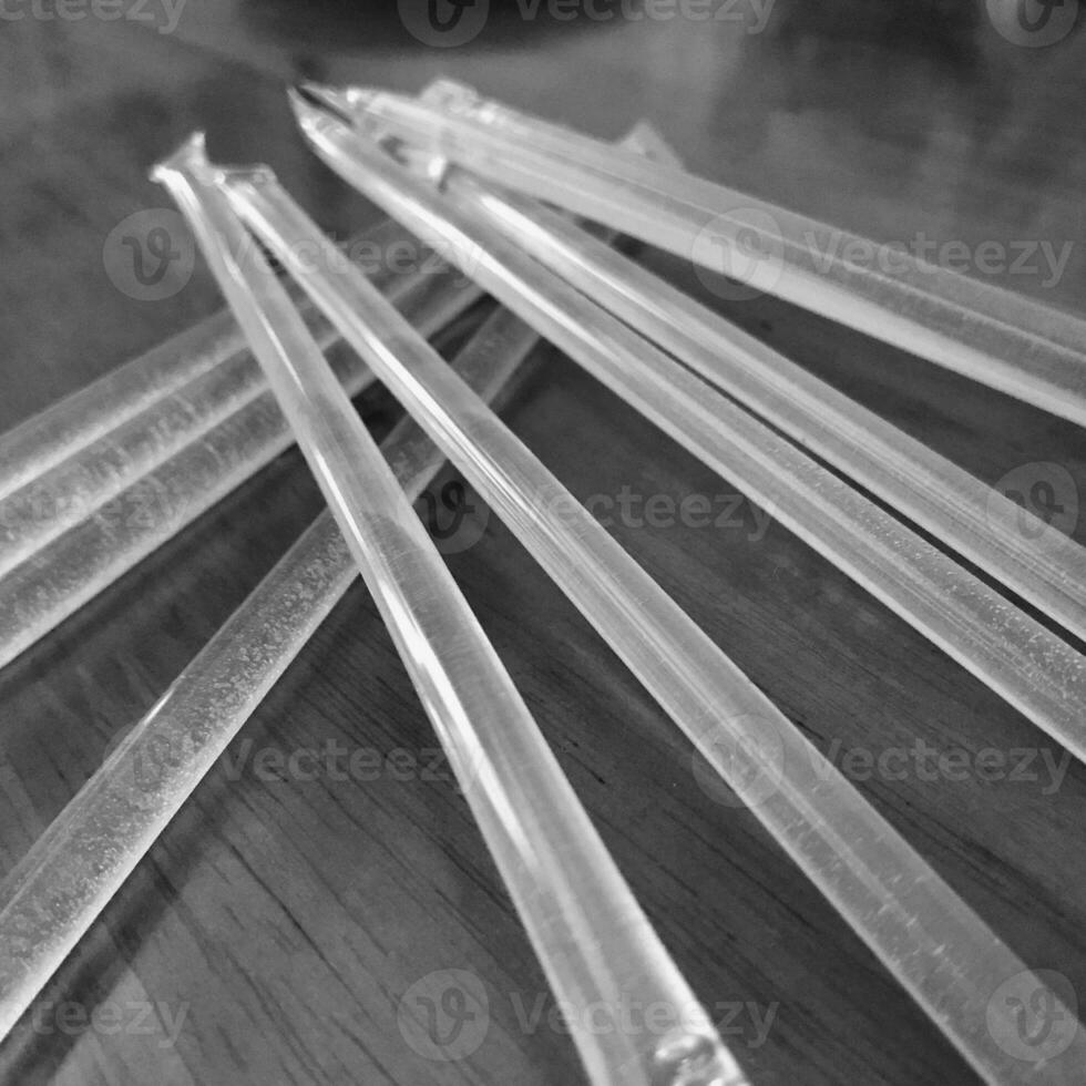 Yellow bee sticks lie beautifully on wooden kitchen table, tasty organic honey dessert photo