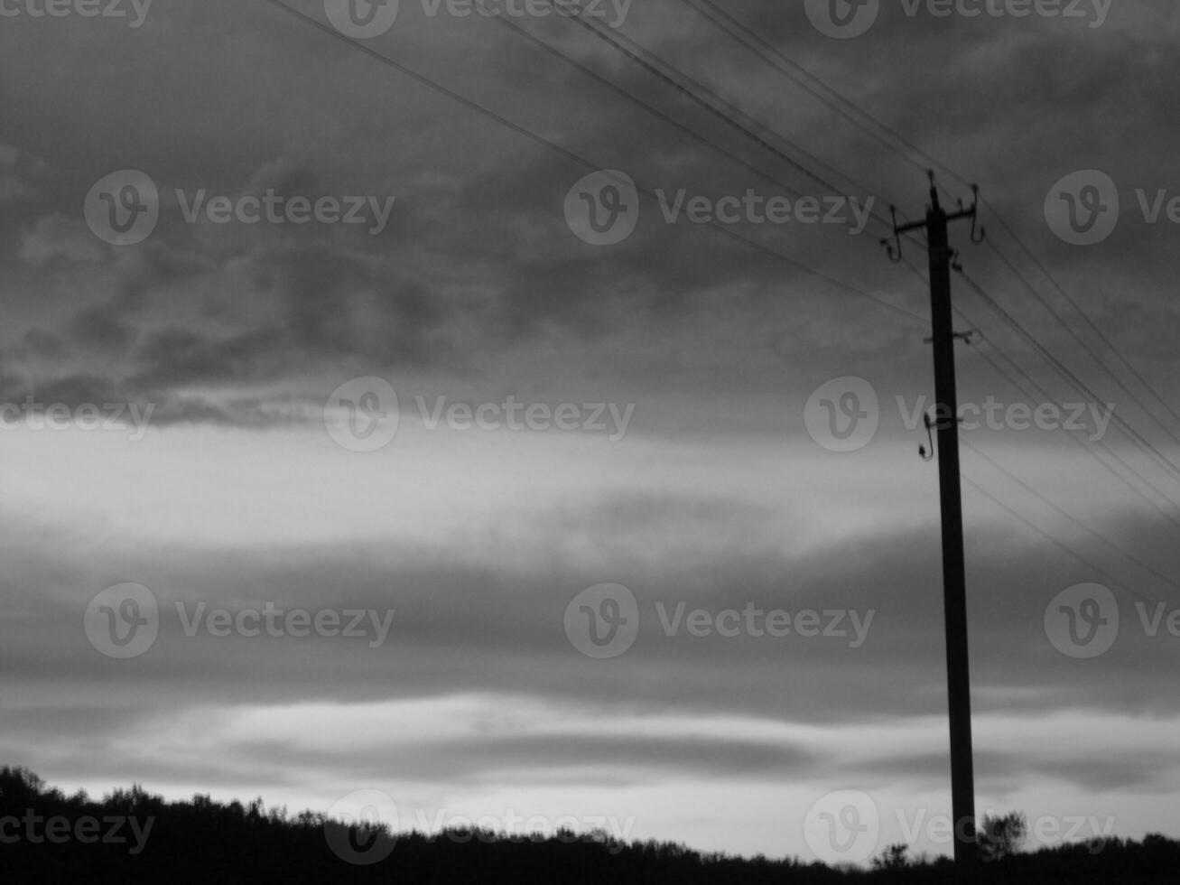 Power electric pole with line wire on colored background close up photo