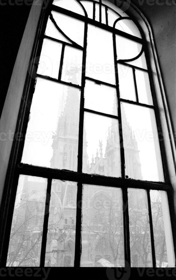 Beautiful wooden frame window in old building without people photo