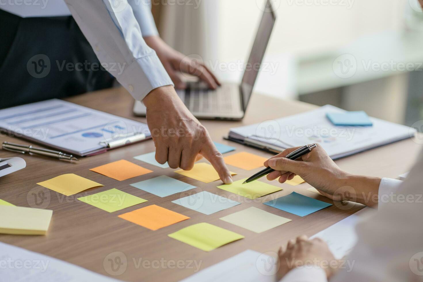 Business People brainstorming Meeting Design Ideas use post it notes to share idea professional investor start up project business brainstorming planning in office photo