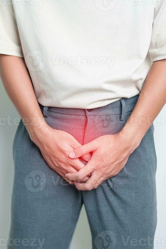 Older Man having Prostate gland or Urinary bladder pain. Prostate Cancer, Enlarged prostate, Prostatitis disease, Hypothyroidism, Male Infertility, Health and World cancer day concept photo