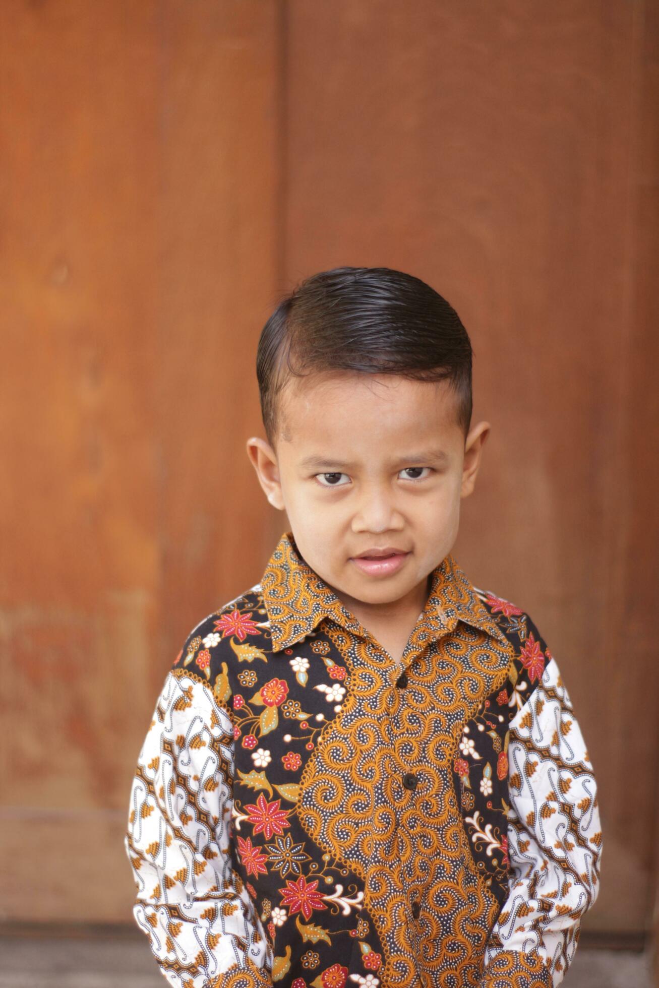 agelang,Indonesia.10022023.A boy is wearing batik on the day of