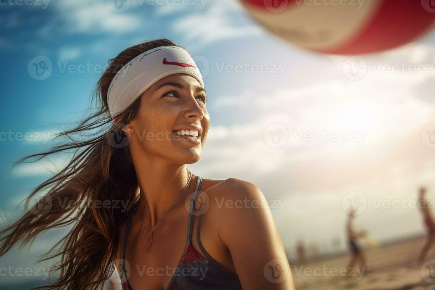 Female beach volleyball players play a volleyball match on the beach