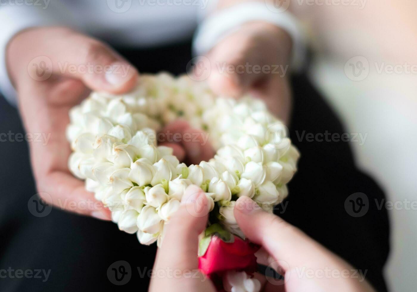 Mother's day, cute asian girl smiling and holding flower garland to give to her mother, family warmth concept, photo