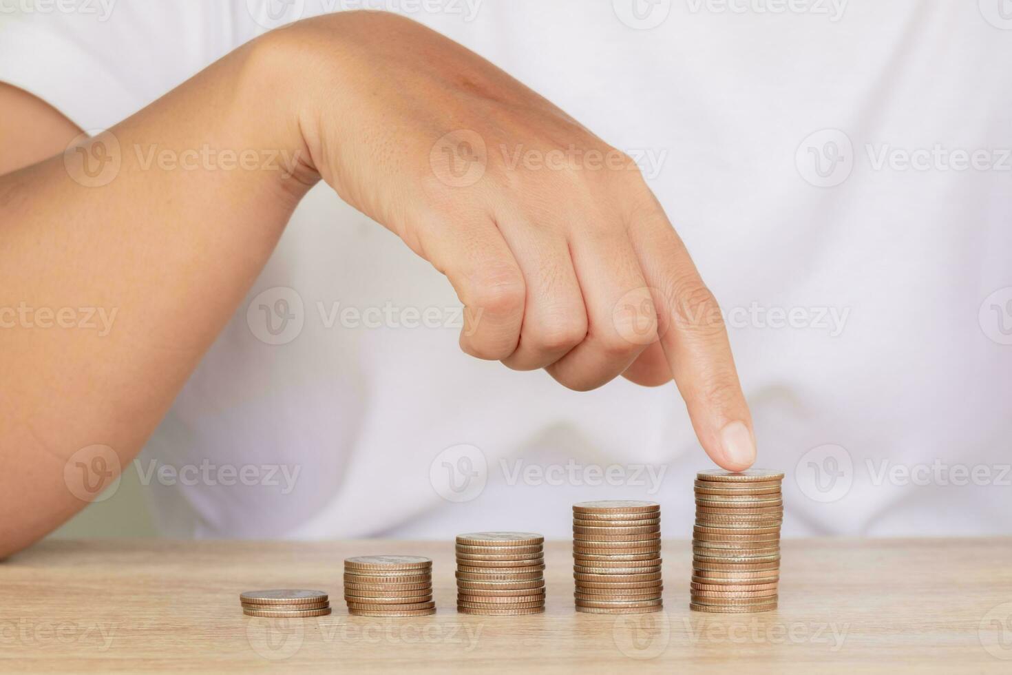 Saving money concept preset by Female hand putting money coin stack growing business, Saving money for future plan for life, management cash photo