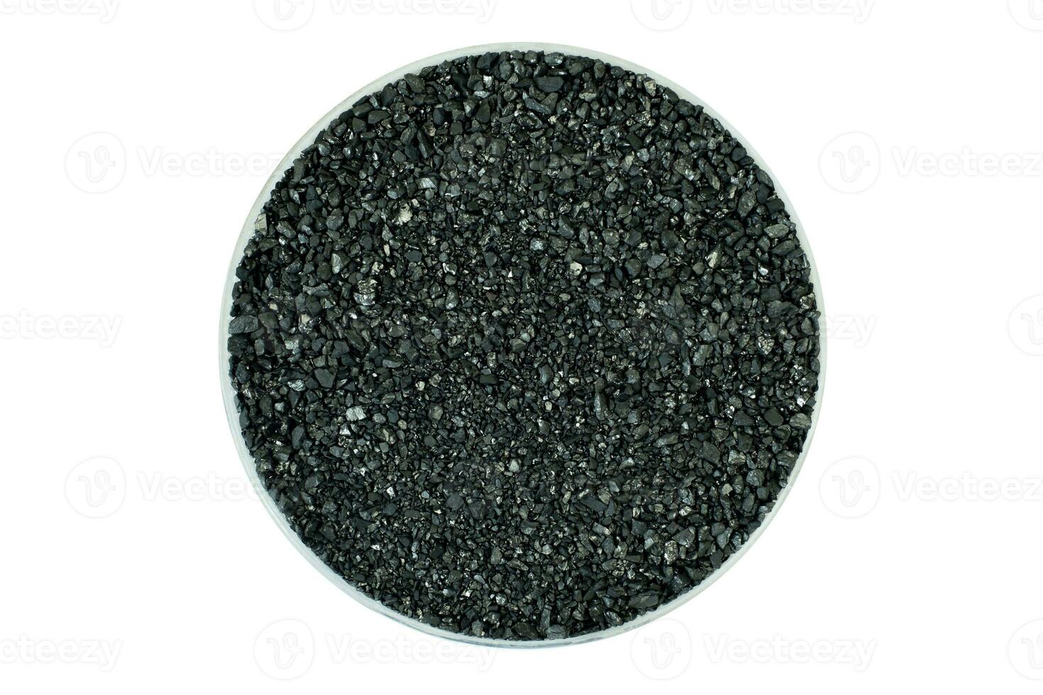 Ion-exchange carbon for water softening beads or granules texture background. carbon water filter for residential drinking or industrial texture surface isolated on white background,top view photo