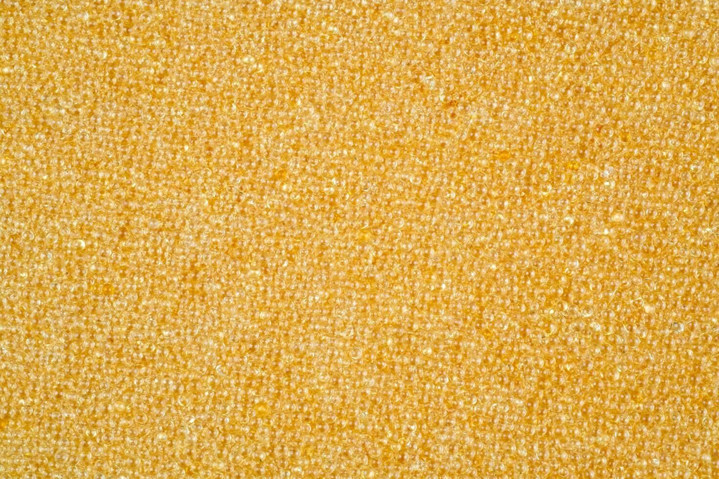 Ion-exchange Resin for water softening beads or granules texture background. Resin water filter for residential drinking or industrial texture surface,top view photo