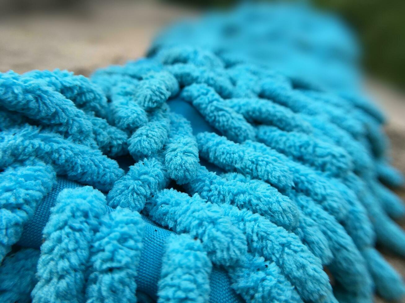 blue rag on a rope on a blur background photo