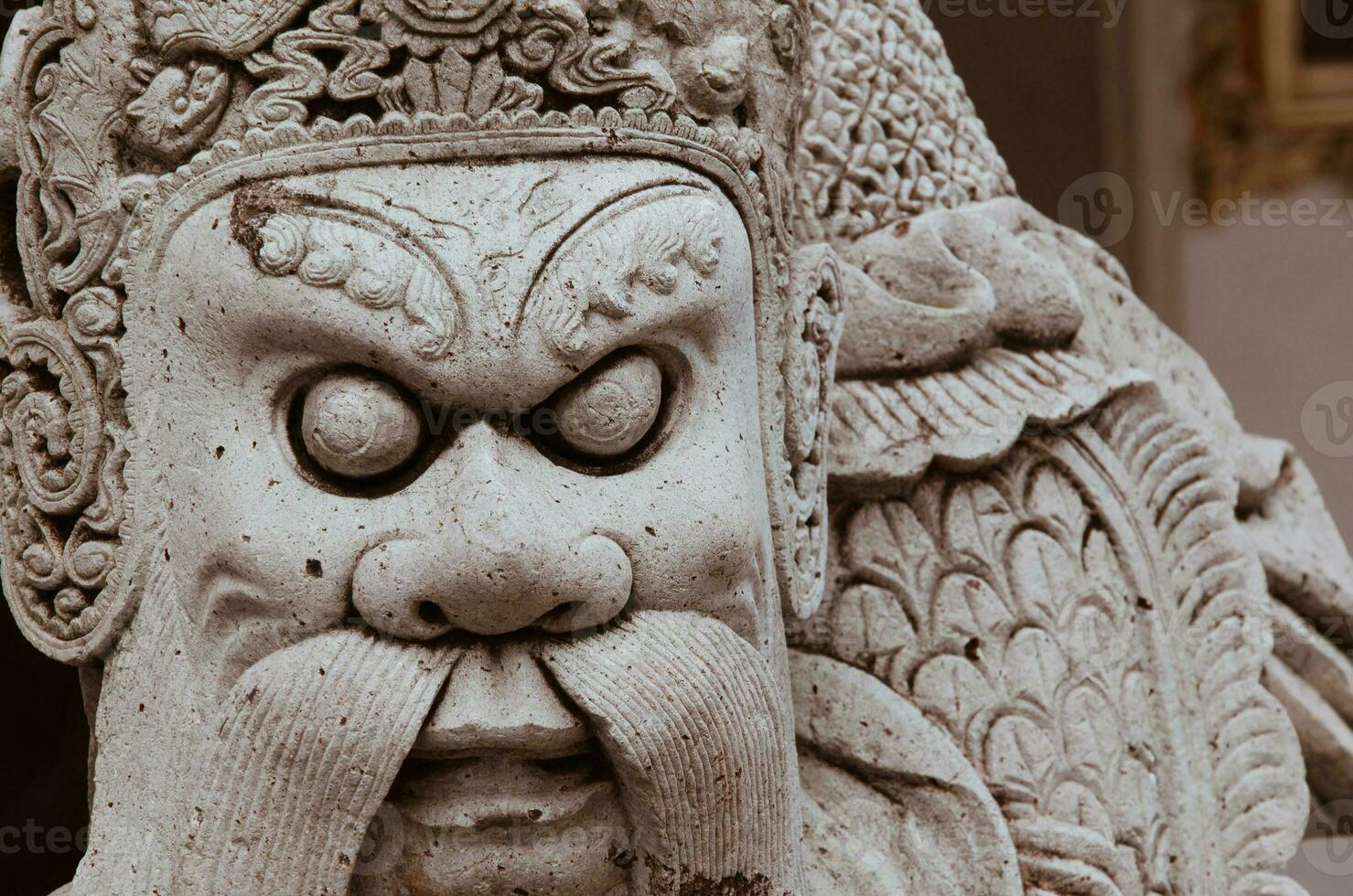 Ancient Chinese Doorguard Stone Statue Outdoor Decoration of Wat Pho Monastery at Bangkok of Thailand photo