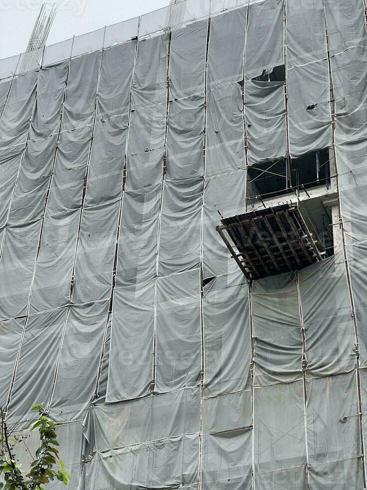 construction site in progress and scaffolding photo