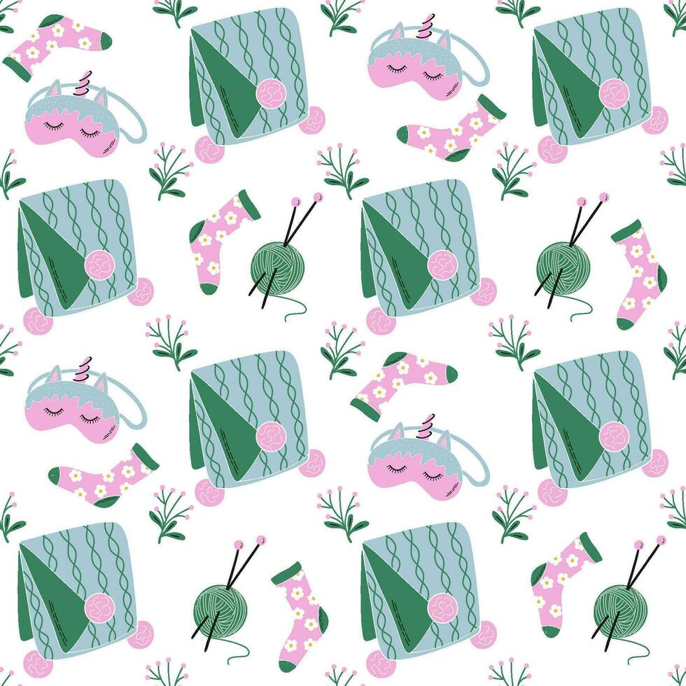 Seamless pattern with Autumn and Winter cozy home elements. Cute objects for home interior, knitting yarn, socks, blanket, sleeping mask . Concept of hygge lifestyle. Hand drawn vector background.