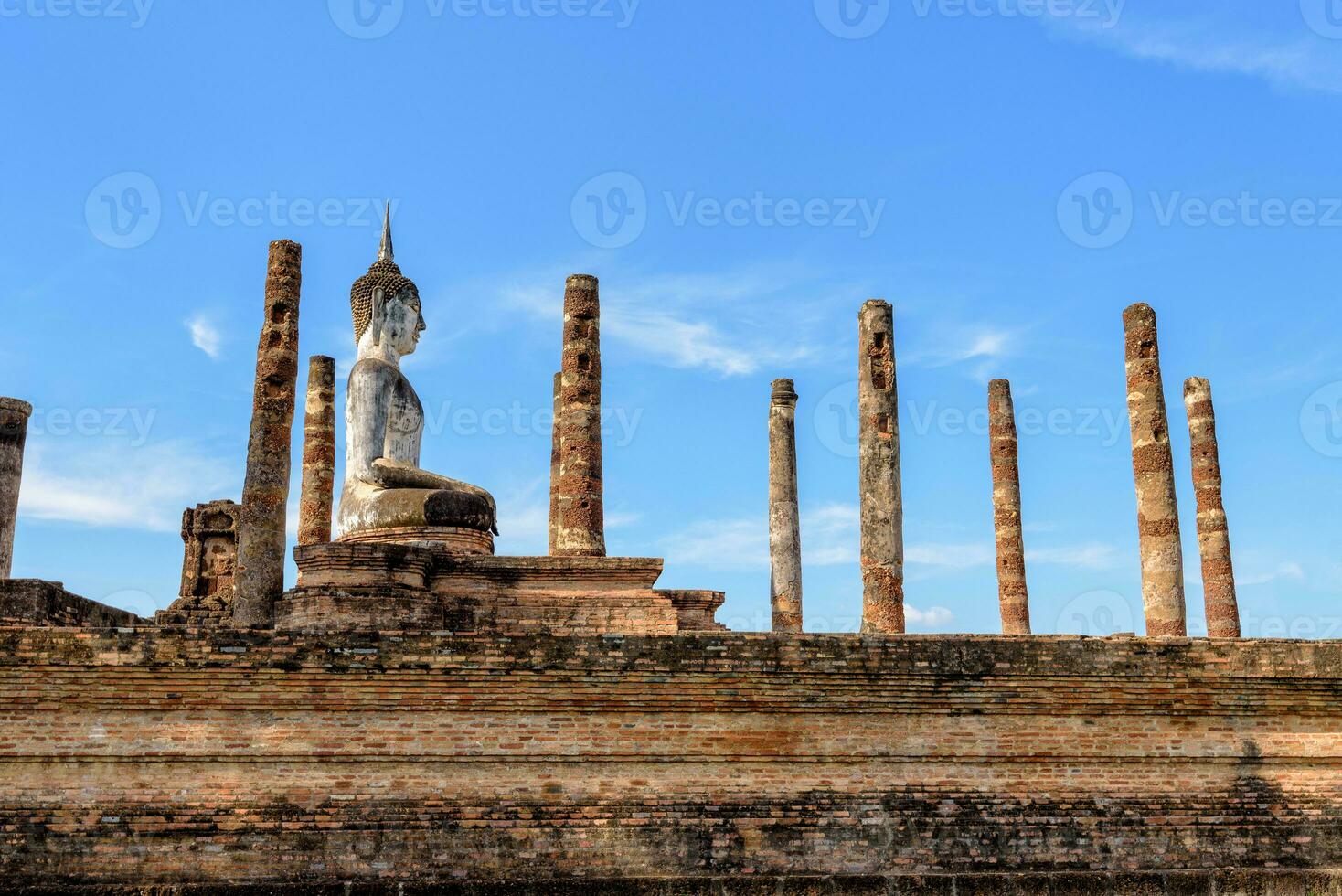 Ancient Buddha statue sitting posture photo