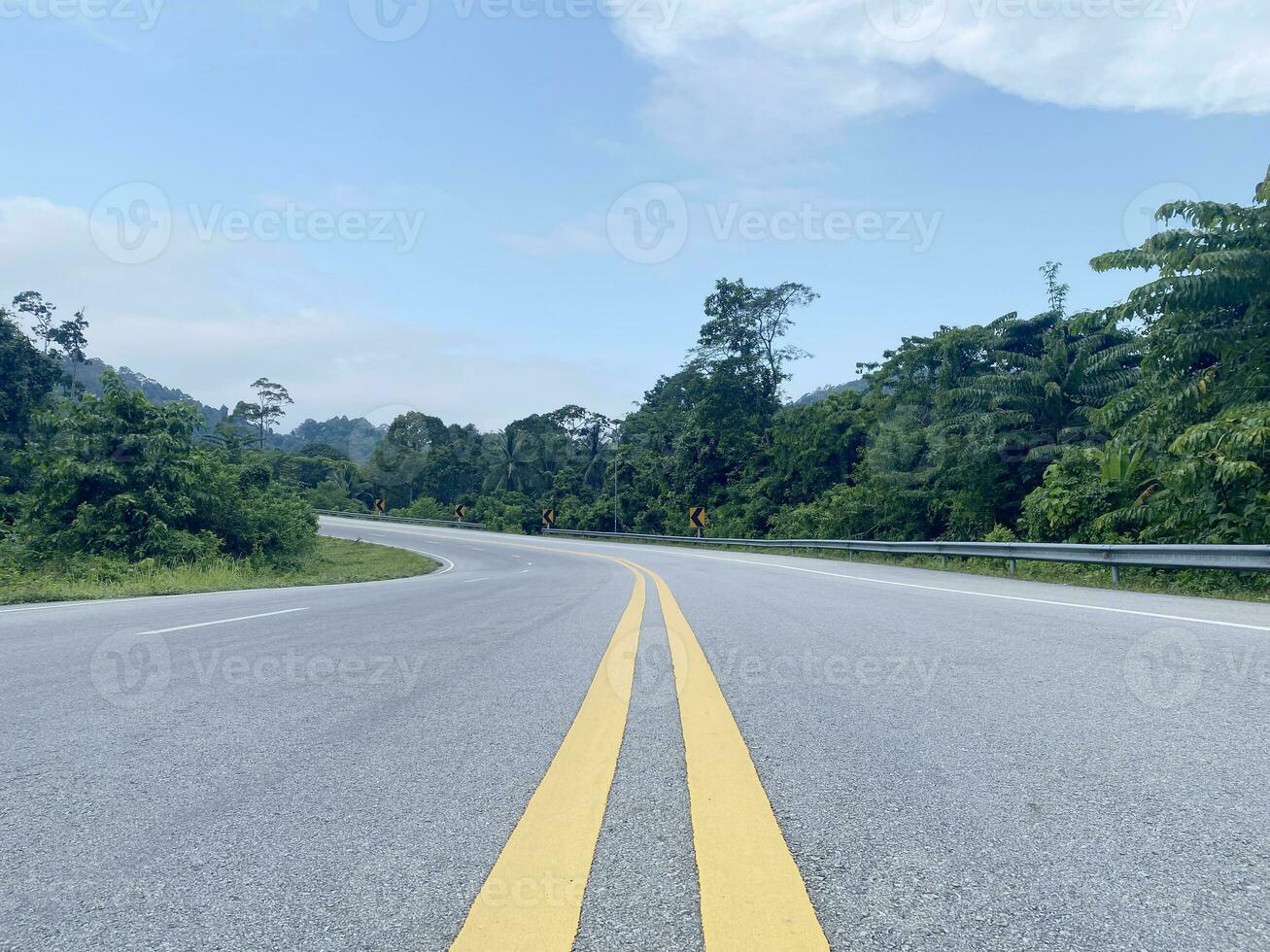 road asphalt in the forest nature countryside of Thailand. photo