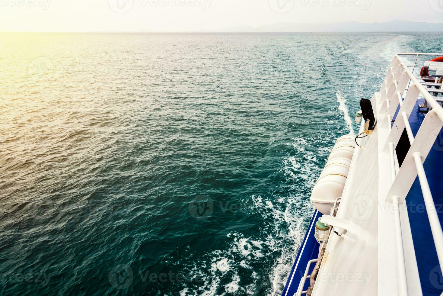 Travel boat during sunset photo