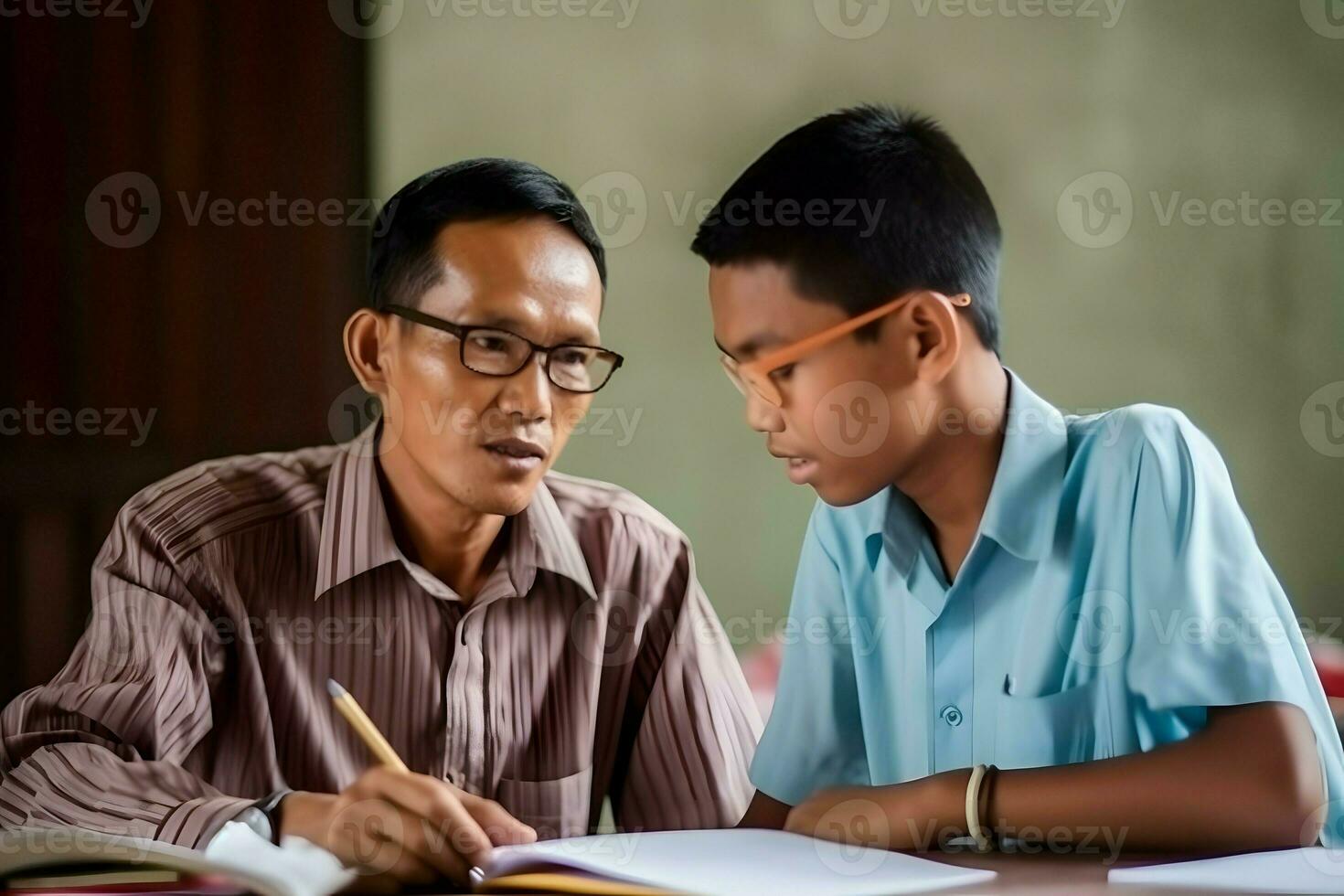 indonesio masculino profesor con su estudiante foto