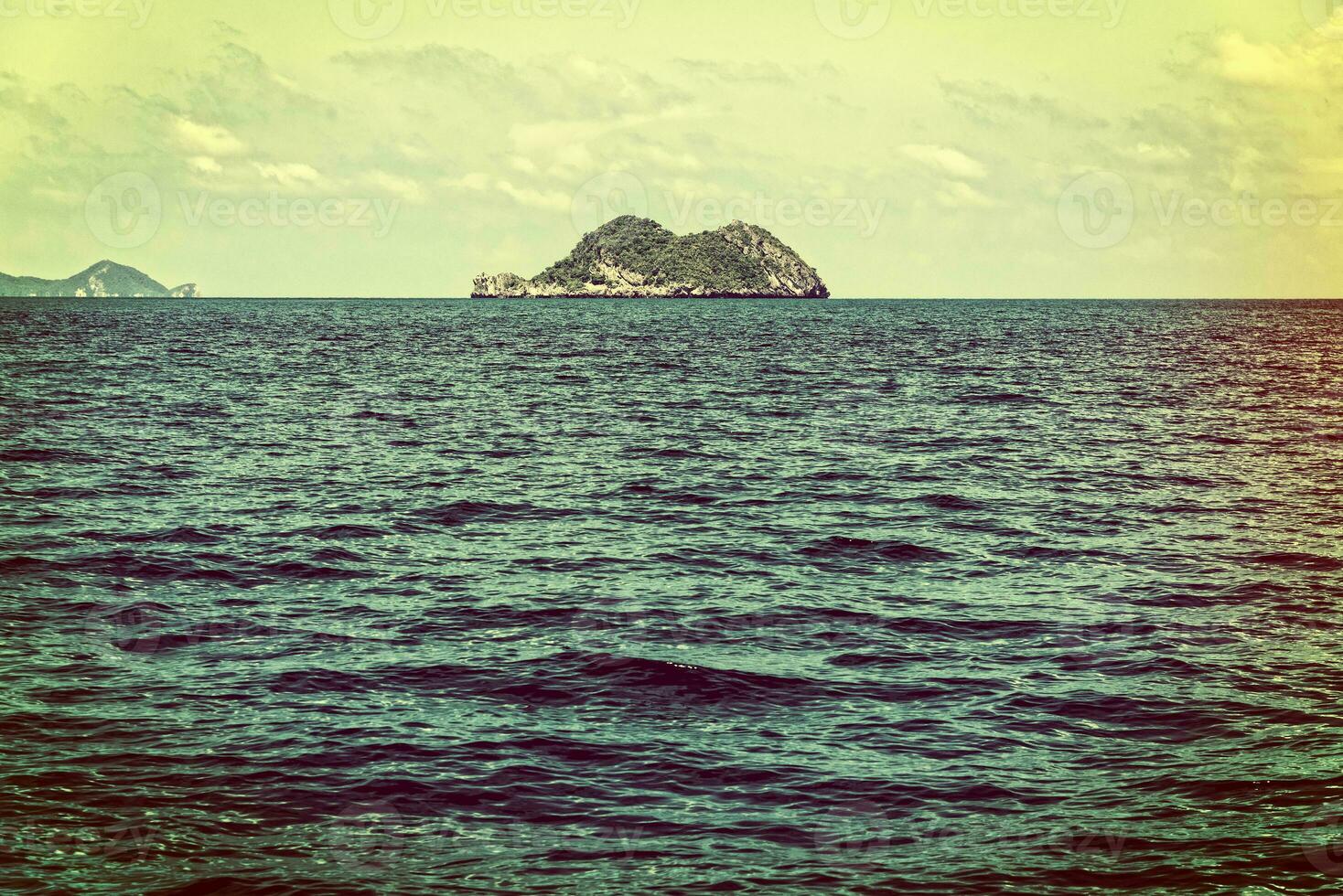 Small island in vintage style photo