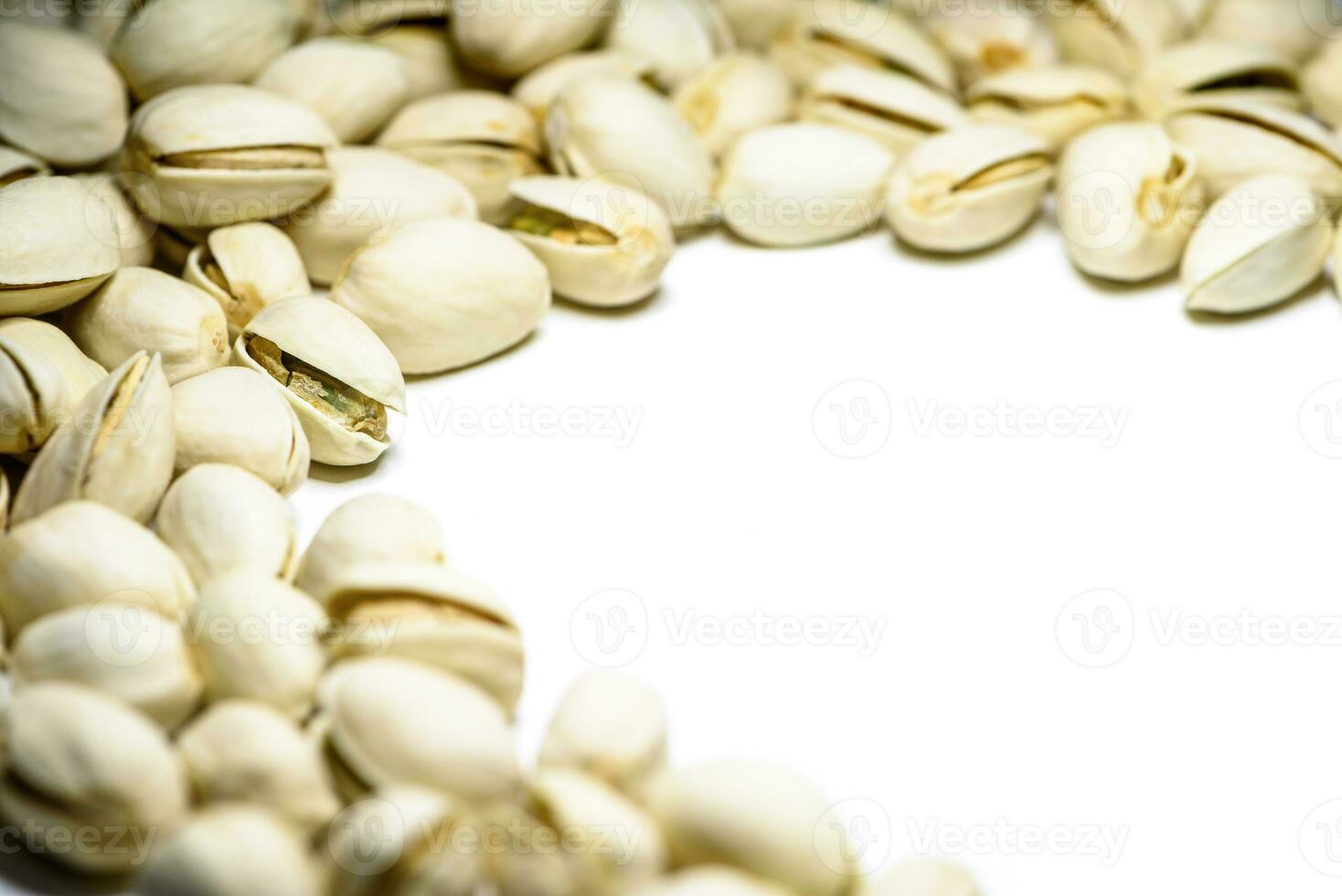 Pile nut of Pistachio or Pistacia vera on table photo