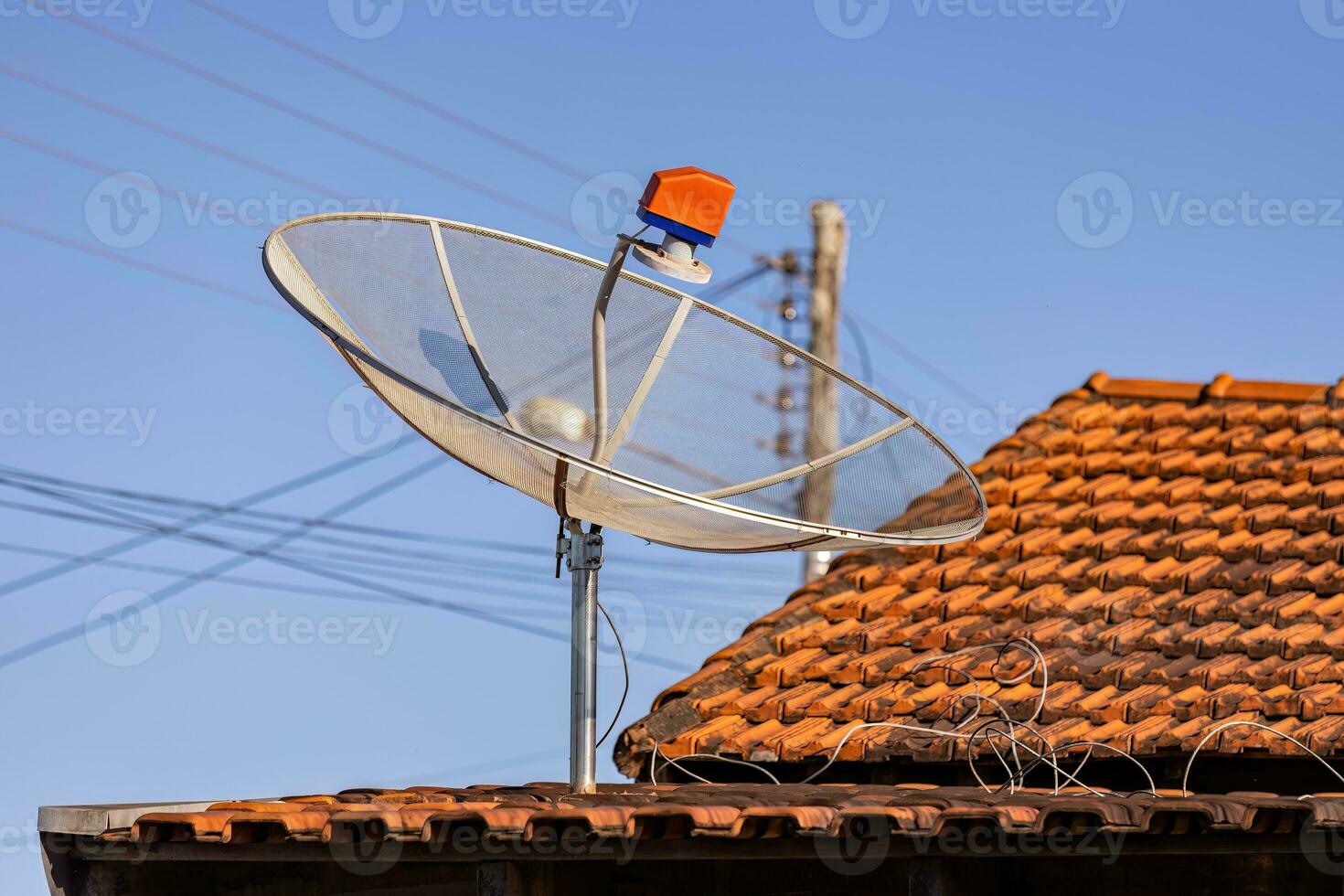 television satellite dish on the roof photo