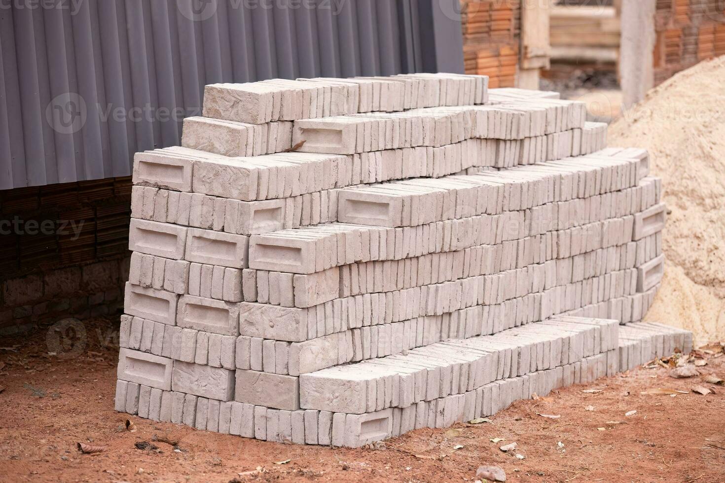 stack of small concrete bricks for building photo