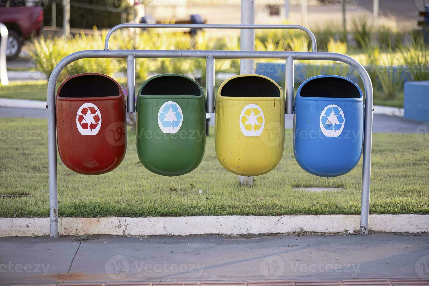 colorful bins for selective garbage collection for recycling photo