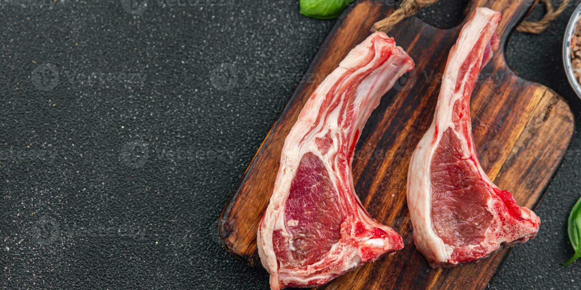 raw lamb meat cutlet on the bone slice food snack on the table copy space food background rustic top view photo