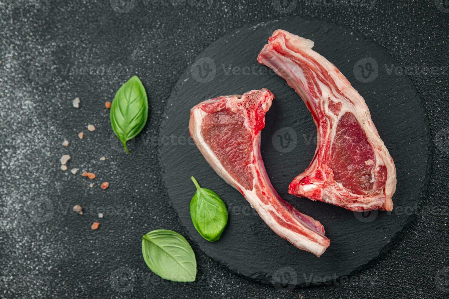 raw lamb meat cutlet on the bone slice food snack on the table copy space food background rustic top view photo