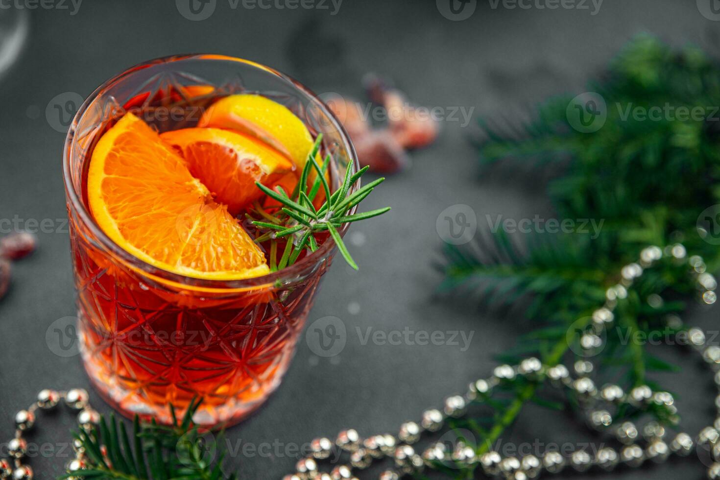 christmas mulled wine cocktail citrus and rosemary traditional drink new year holiday appetizer meal food snack on the table photo
