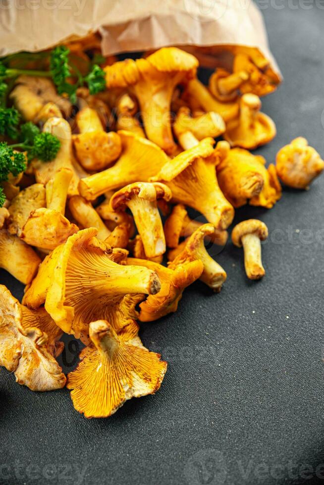 chanterelles fresh mushrooms delicious mushroom appetizer meal food snack on the table copy space food background rustic top view keto or paleo diet vegetarian vegan food photo