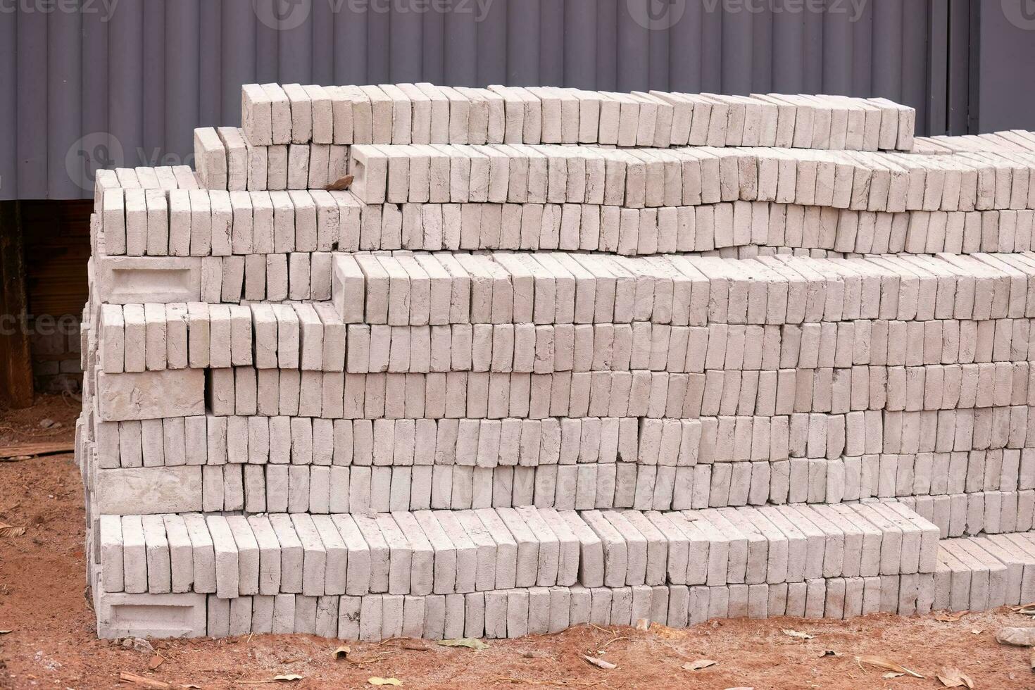 stack of small concrete bricks for building photo