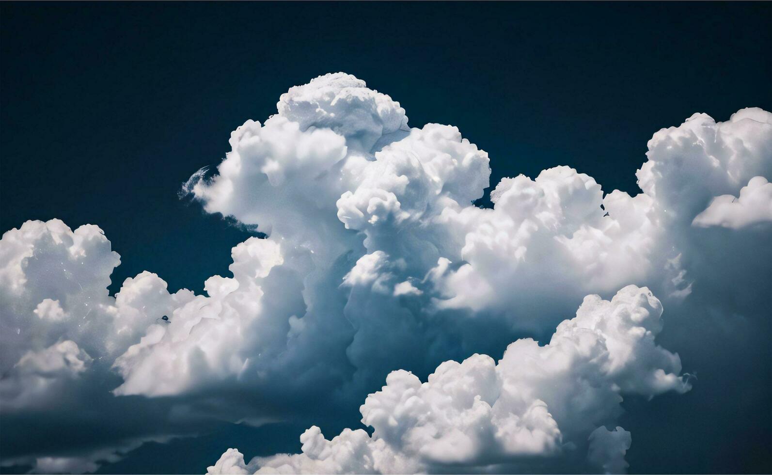 The Photo of the Fluffy Clouds Background Wallpaper