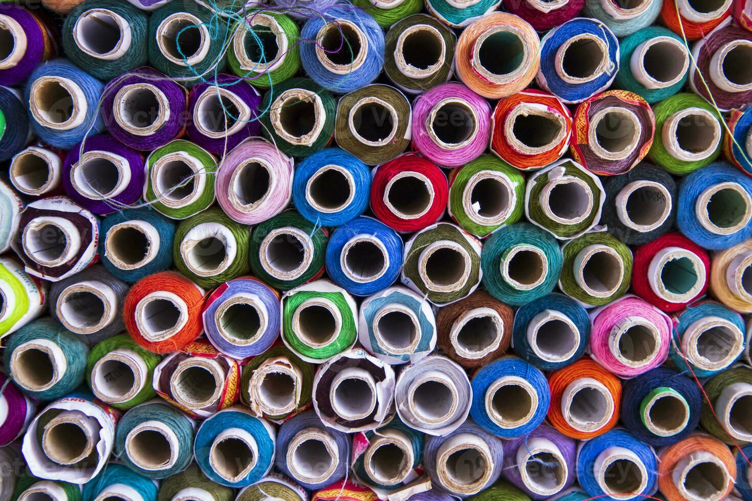 Multicolored Sewing threads pattern texture can be used as a background wallpaper photo