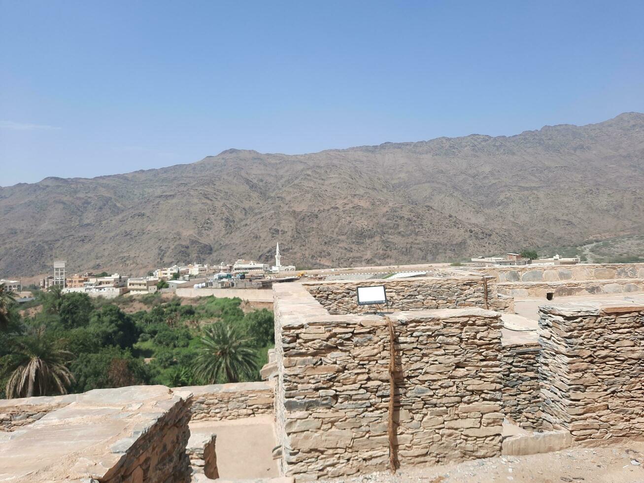 Al Bahah, Saudi Arabia, Sep 2023 - Beautiful daytime view of the historical ruins of Thee Ain Zee Ain or Dhee Ain  Ancient Village in Al Bahah, Saudi Arabia. photo