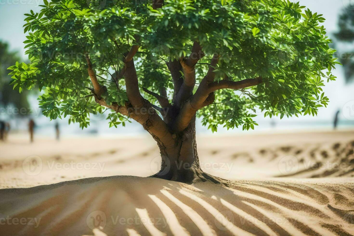a tree on the beach with sand in the background. AI-Generated photo