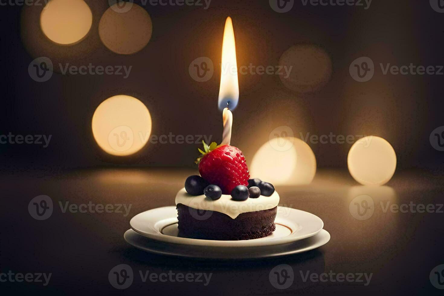 a small cupcake with a strawberry and a candle. AI-Generated photo