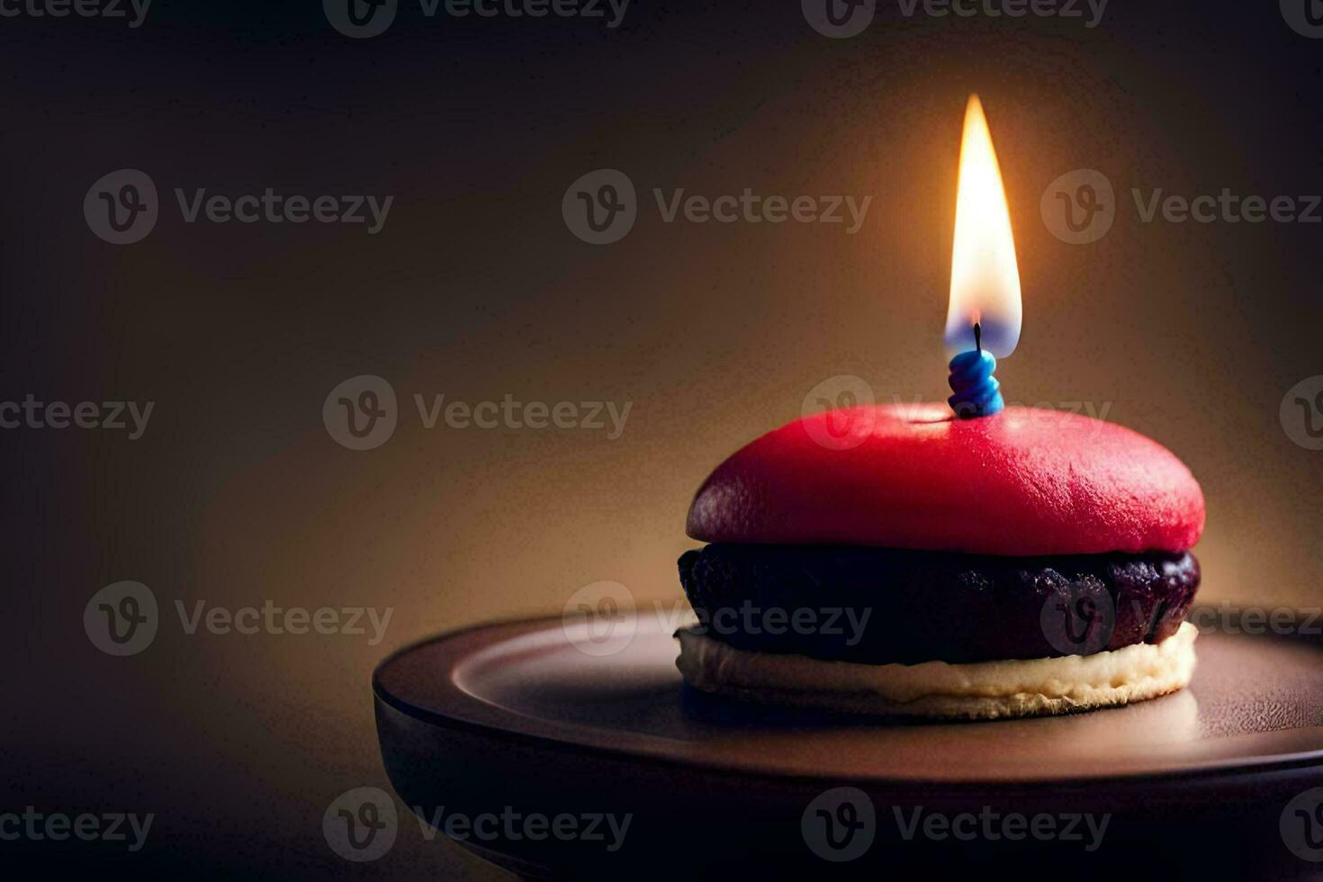 a small red cake with a candle on top. AI-Generated photo