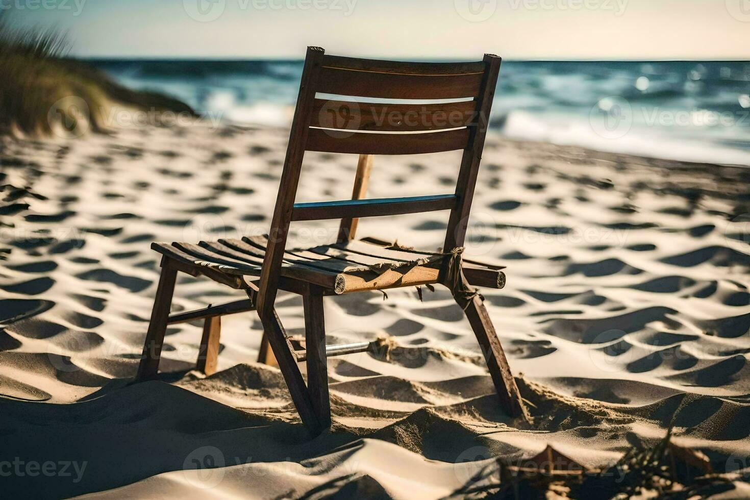 a wooden chair sits on the sand near the ocean. AI-Generated photo