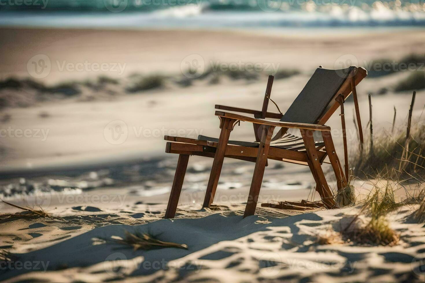 a wooden chair sits on the sand near the ocean. AI-Generated photo
