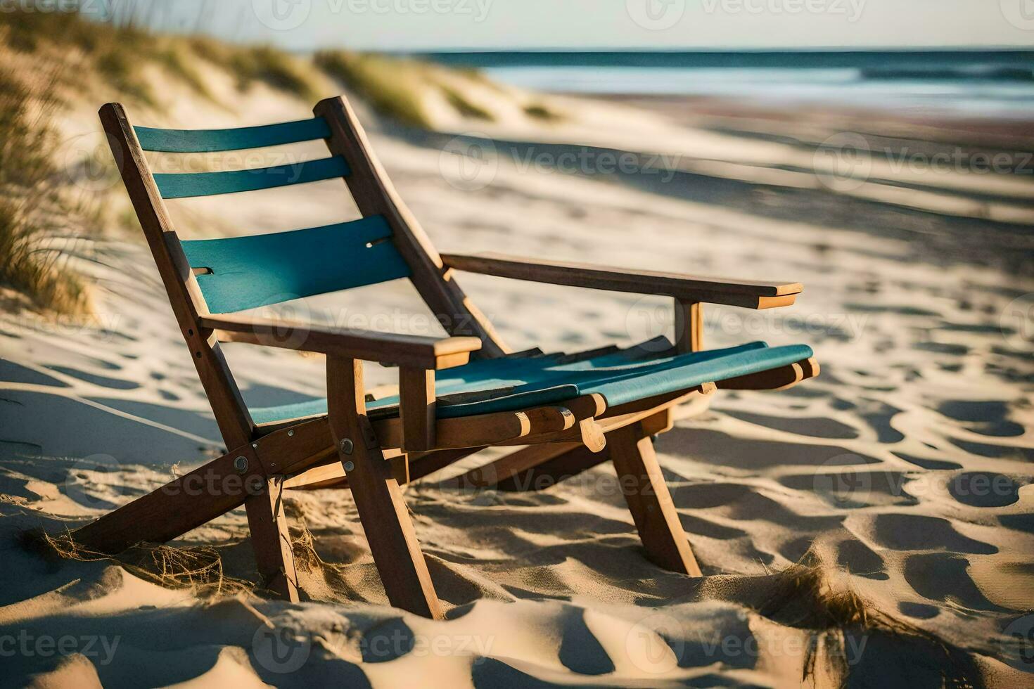 a wooden chair sits on the sand near the ocean. AI-Generated photo