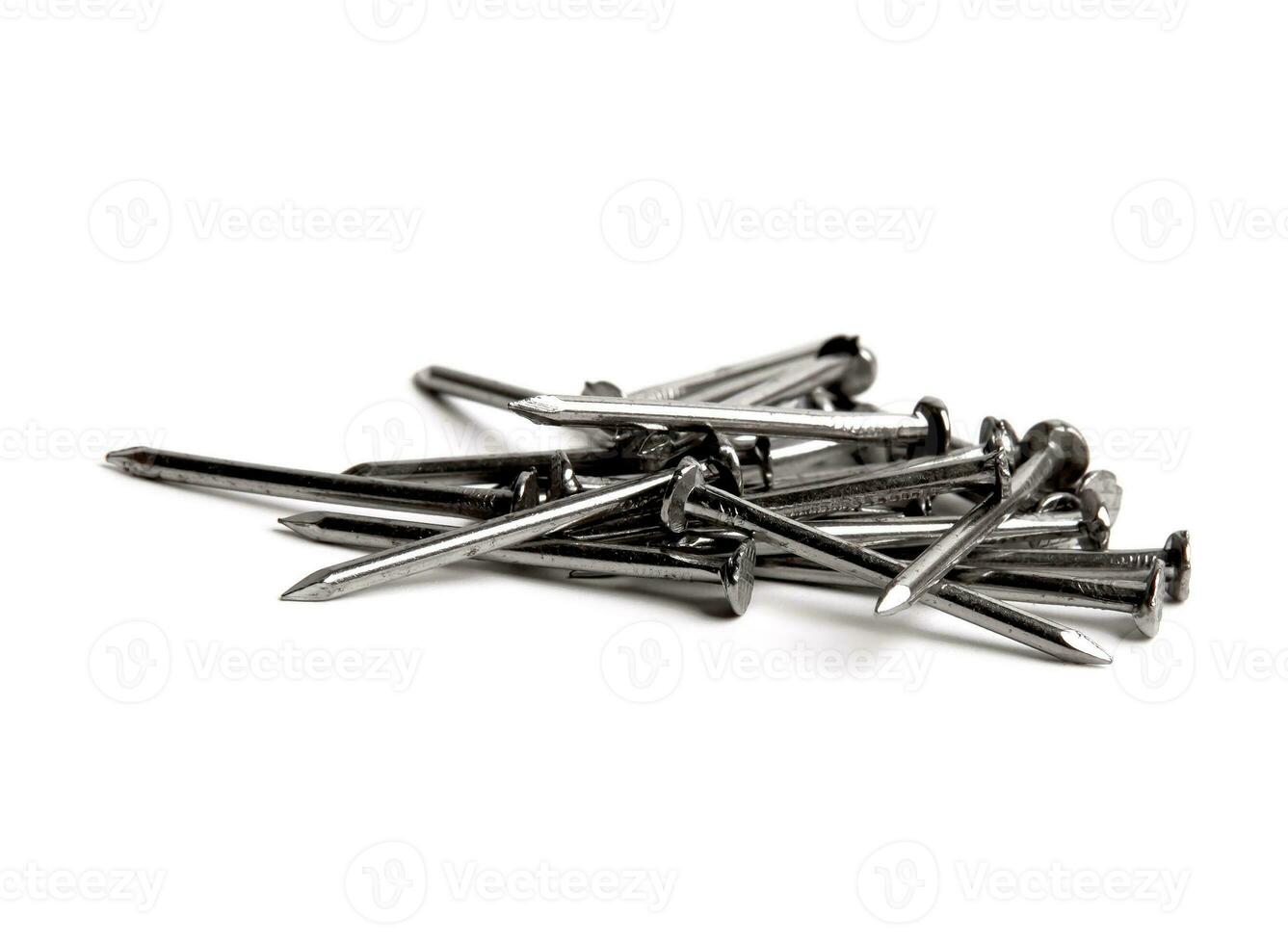 Pile Of Silver Shiny Sharp Metal Nails Closeup Photo Isolated On White Background