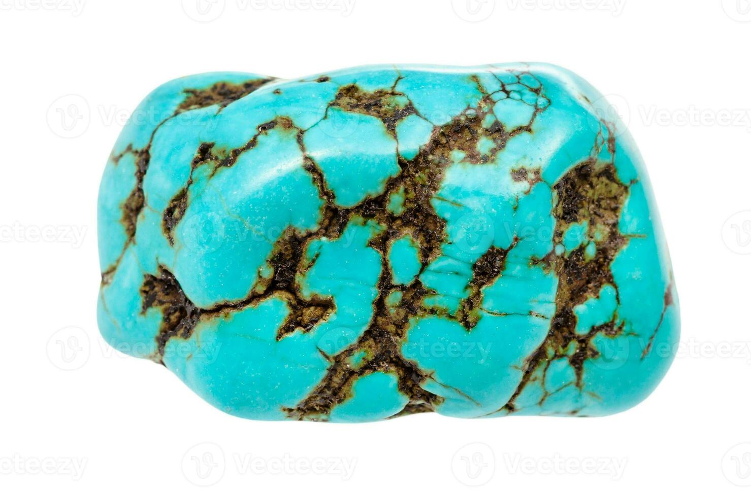 rolled Turquenite gem stone isolated on white photo