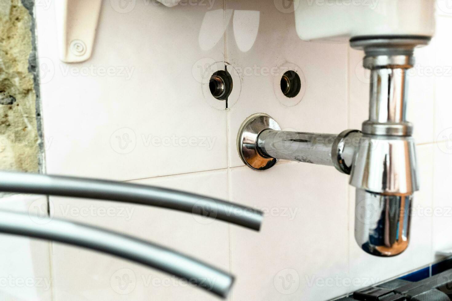 sink siphon and polyethylene flexible water pipes photo