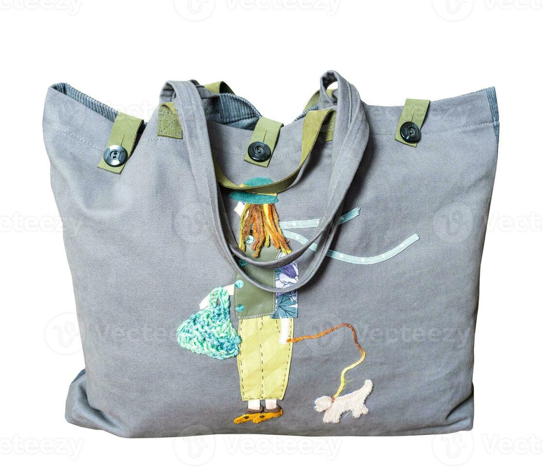 closed handmade gray canvas tote bag with applique photo