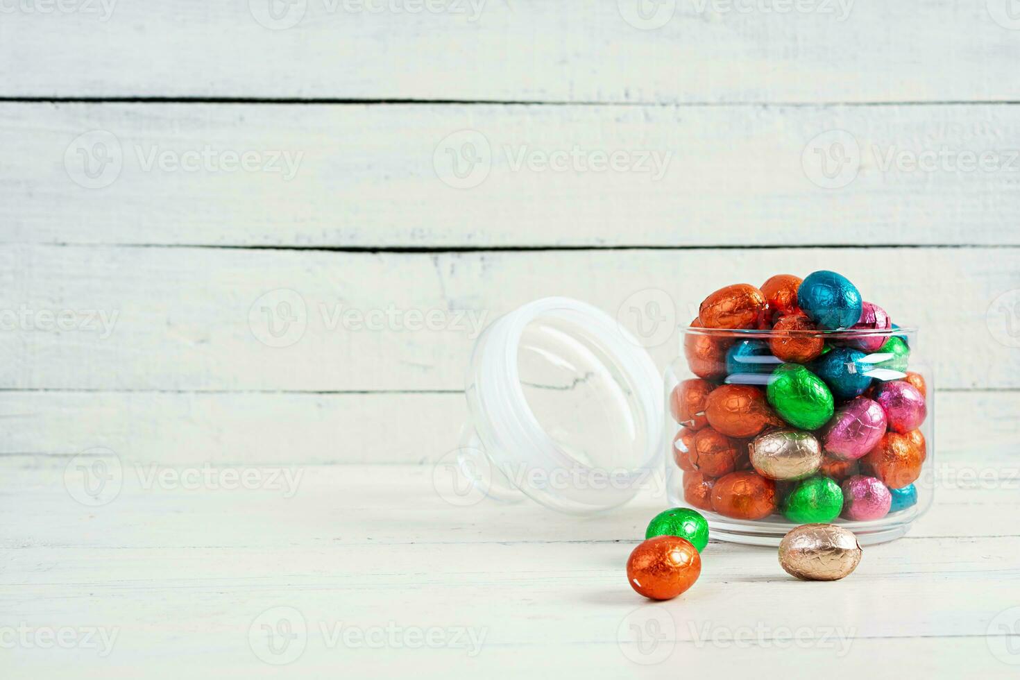 Colorful background of Easter chocolate eggs. Delicious chocolate eggs photo